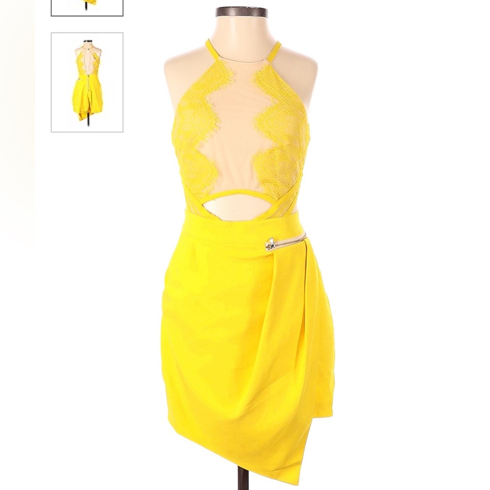 Sexy yellow skort romper with mesh paneling.